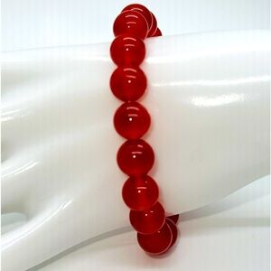Orange Carnelian stretch bracelet. New. Unused.​​